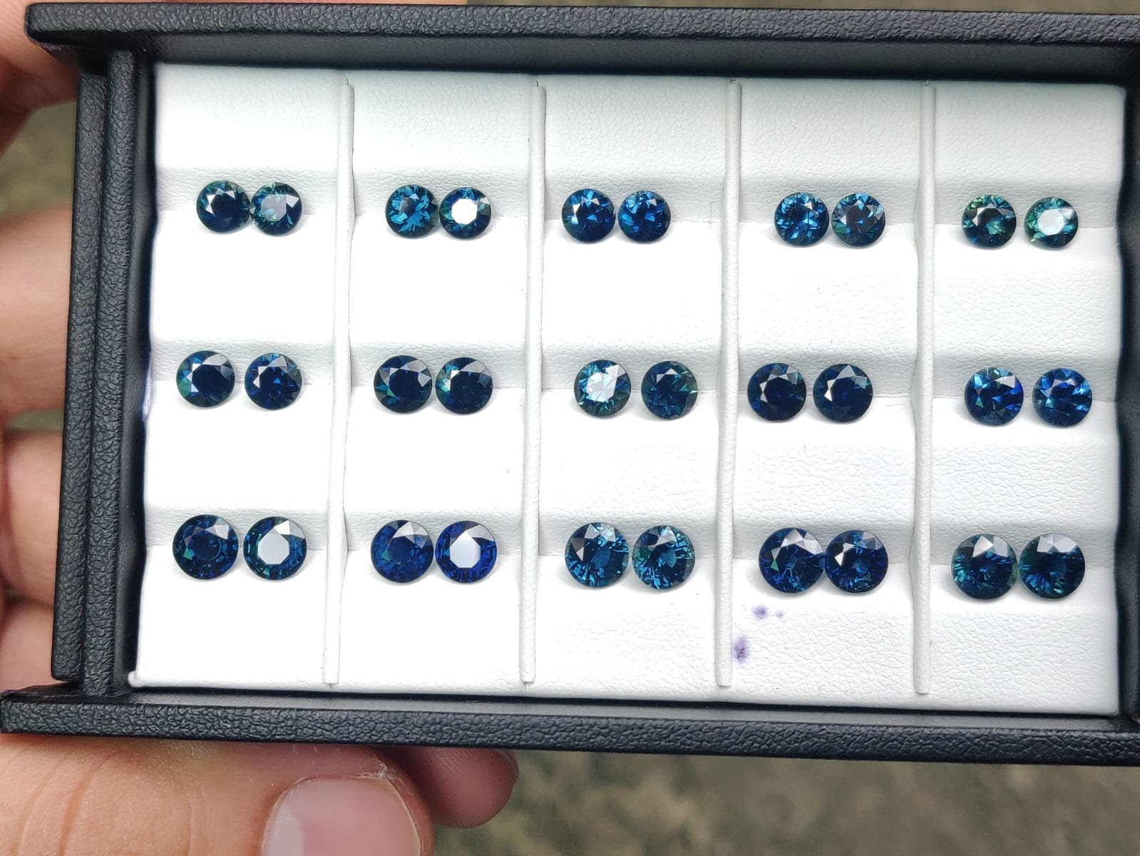 Round, brilliant cut mermaid sapphire