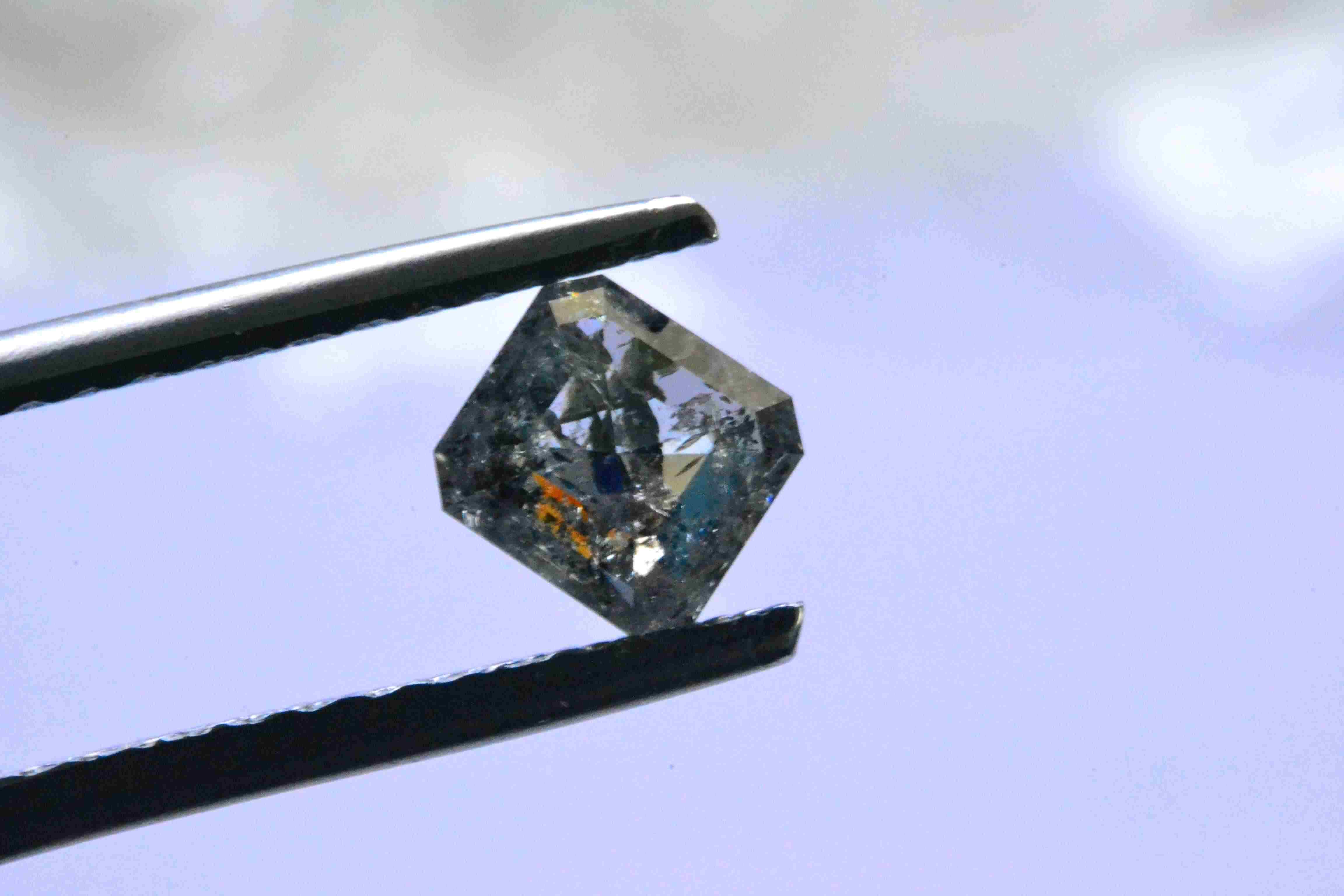 Almost black with a faint yellowish orange undertone