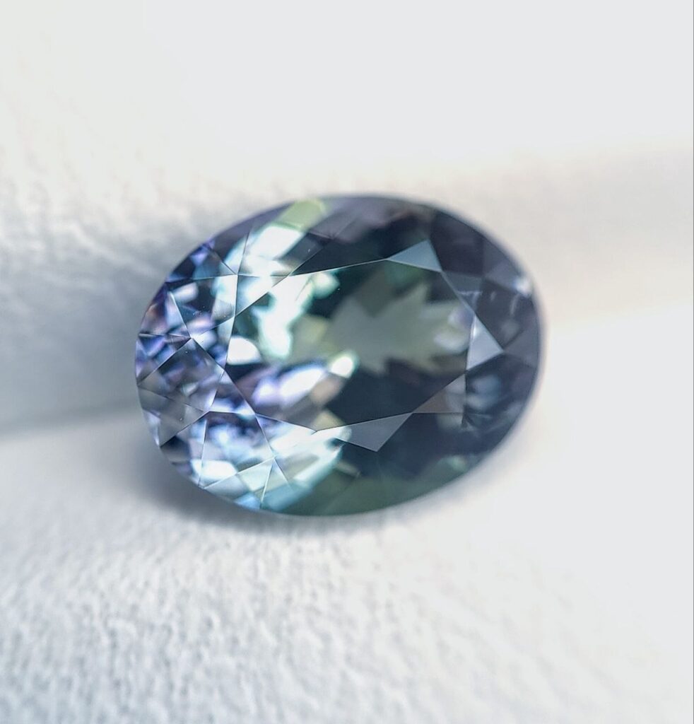 Unheated, bicolor teal tanzanite cut at NGM, Bangkok.